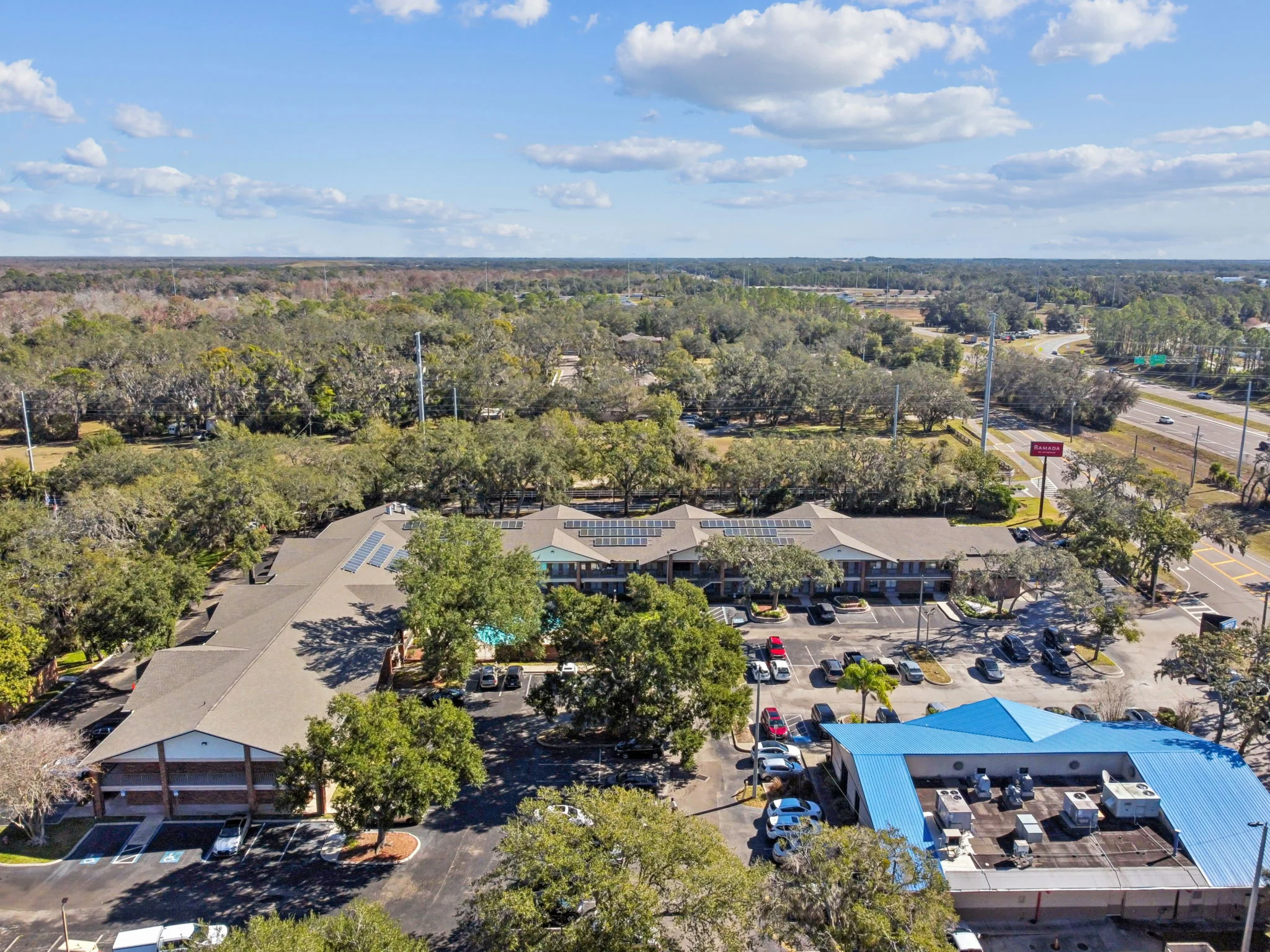 Aerial side view of Ramada Inn Temple Terrace